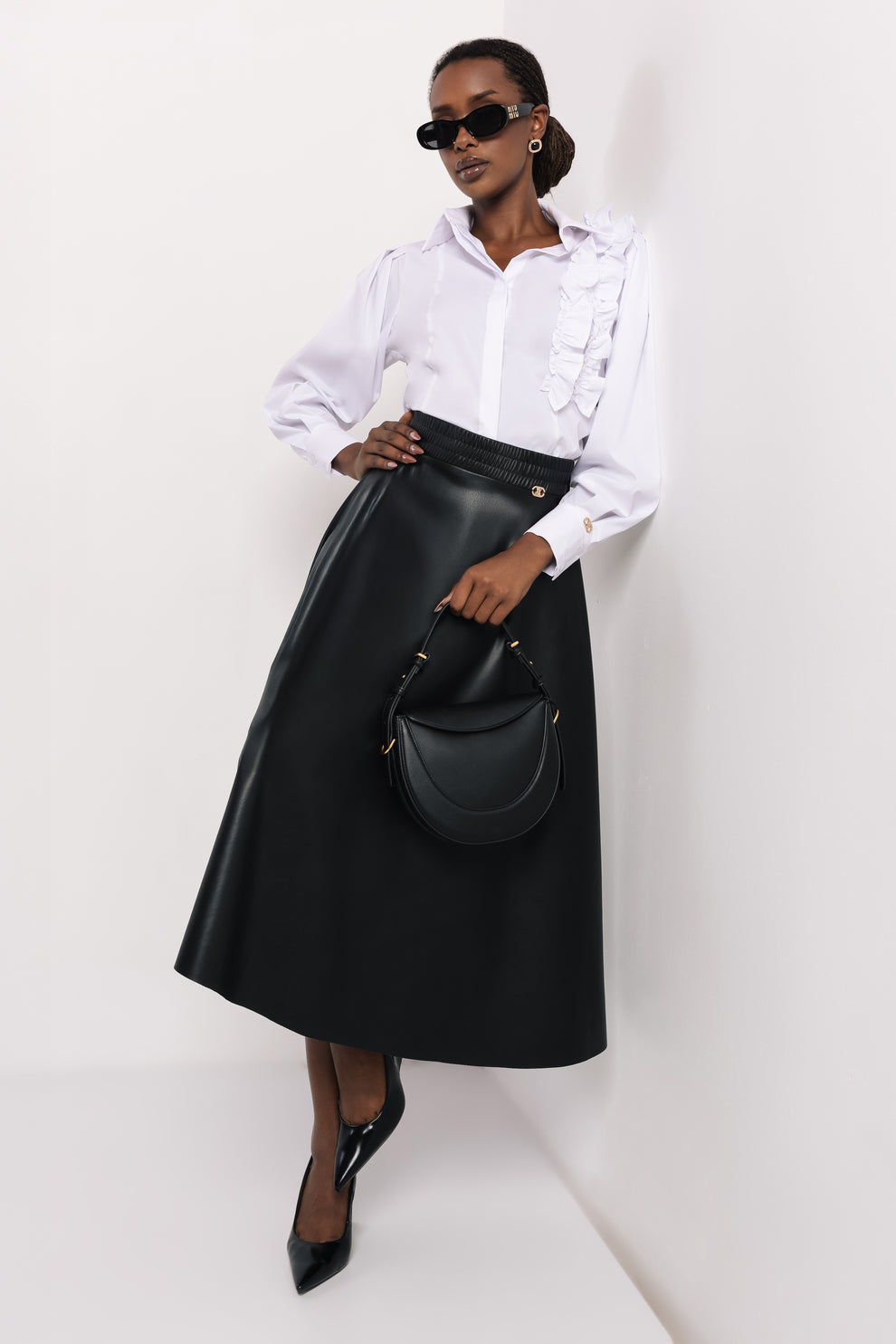 AMNESIA Nezom sukňa koženková čierna